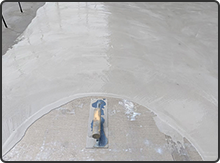 ポリマーセメント系塗膜防水 通気緩衝工法 1回目の防水材を塗布します。
